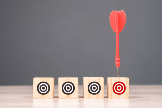 Red dart hitting target block 