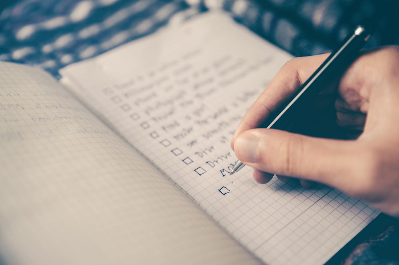 Taking notes on thoughts and ideas.